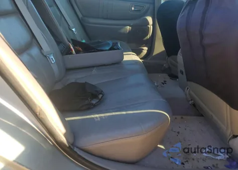 2003 Toyota Avalon Xl z USA, uszkodzony, nr VIN 4T1BF28B33U293359